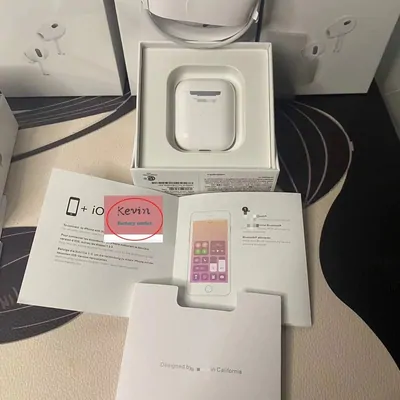 Small white electronic accessories in retail packaging